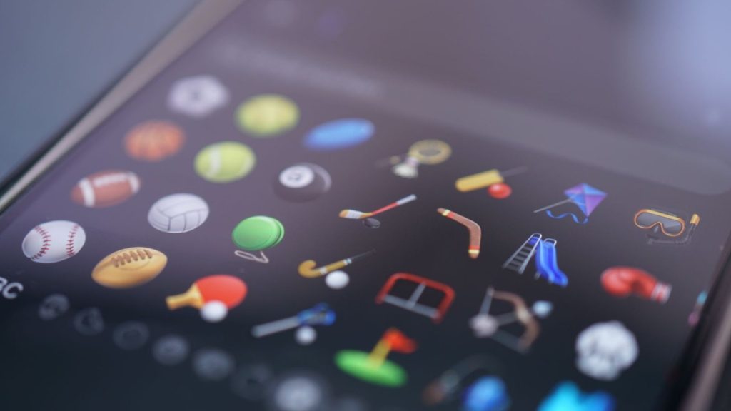 A detailed view of various sports-themed emojis displayed on a smartphone screen.